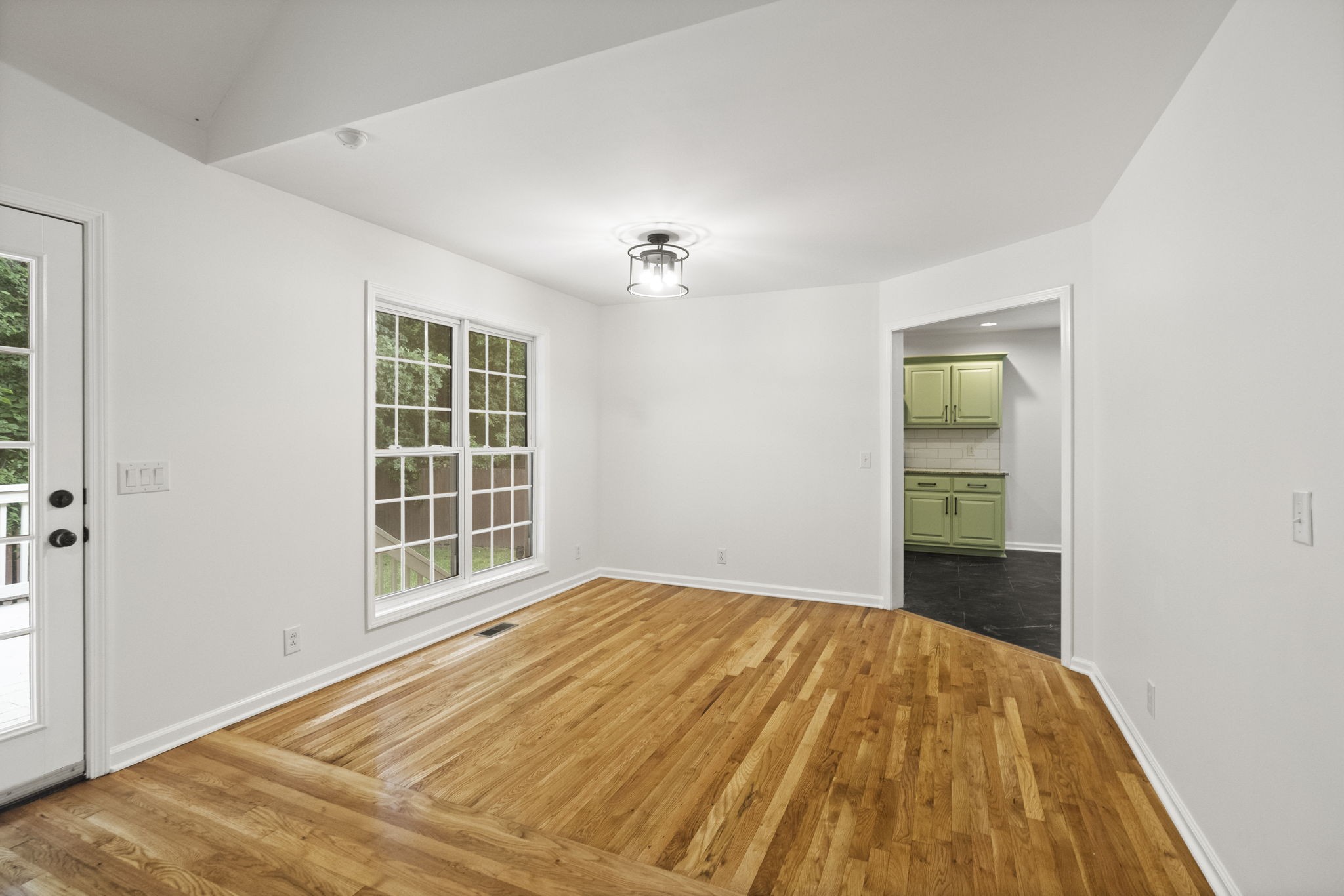 164 Foxrun Springfield, TN 37172 - Photo 10 of 37 wooden floor in an empty room with a window