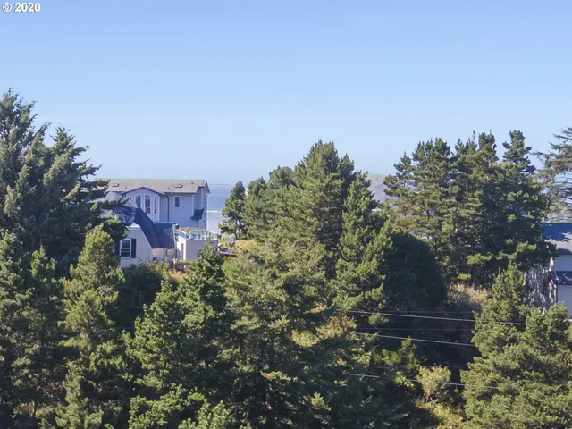 a view of a pathway with a field