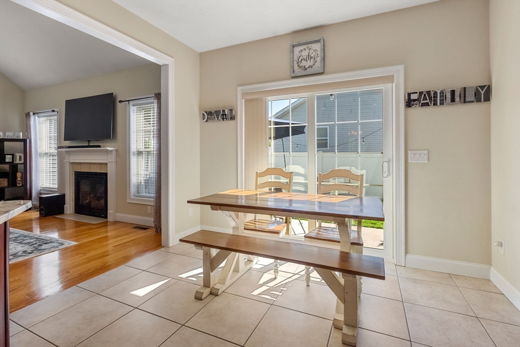 63 Vista Circle Holden, MA 01520 - Photo 17 of 36 a view of a livingroom with furniture and a fireplace