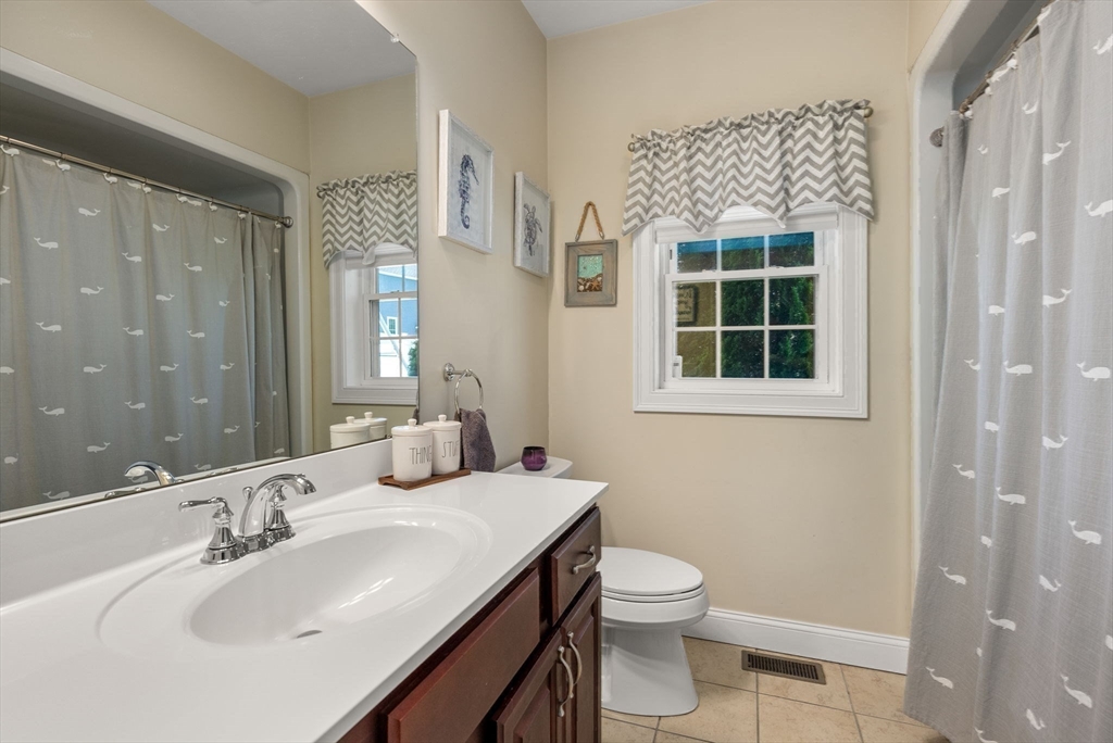 63 Vista Circle Holden, MA 01520 - Photo 23 of 36 a bathroom with a sink toilet and shower