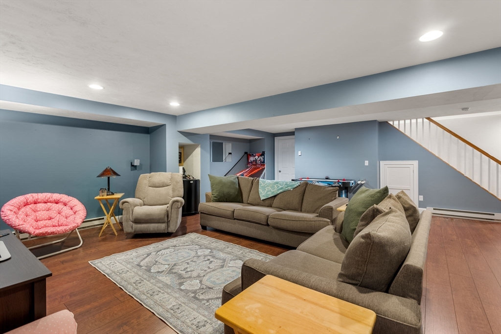 63 Vista Circle Holden, MA 01520 - Photo 27 of 36 a living room with furniture and a couch