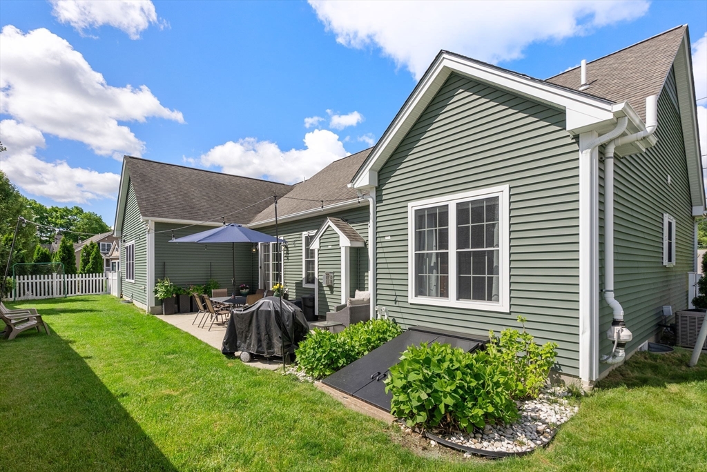 63 Vista Circle Holden, MA 01520 - Photo 29 of 36 a view of a house with backyard and porch
