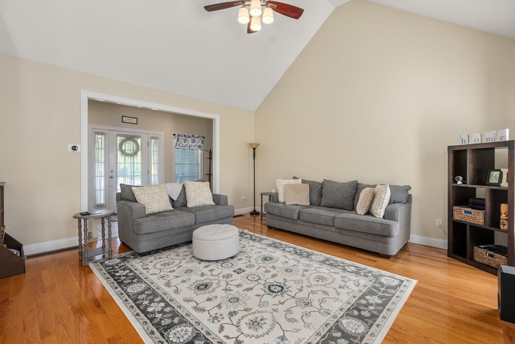 63 Vista Circle Holden, MA 01520 - Photo 7 of 36 a living room with furniture and a rug