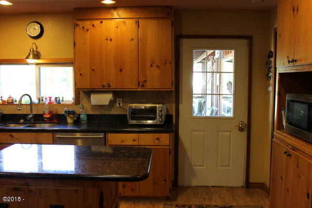 290 Camp 12 Loop Toledo, OR 97391 - Photo 21 of 29 Kitchen door to front Porch