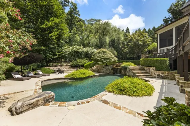 a view of a dining room with furniture and window