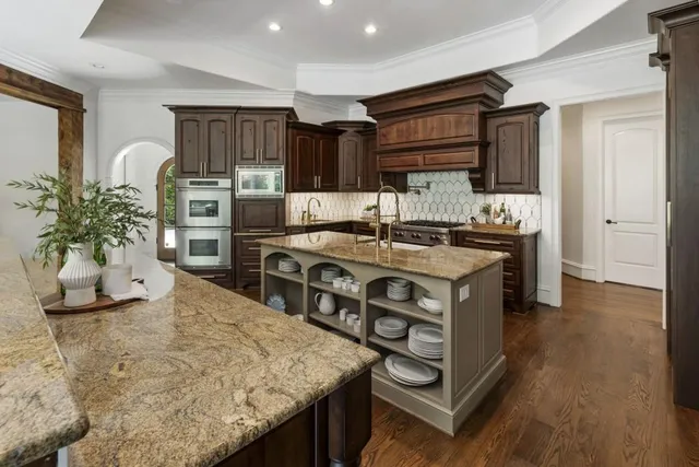 a bathroom with a sink toilet and mirror