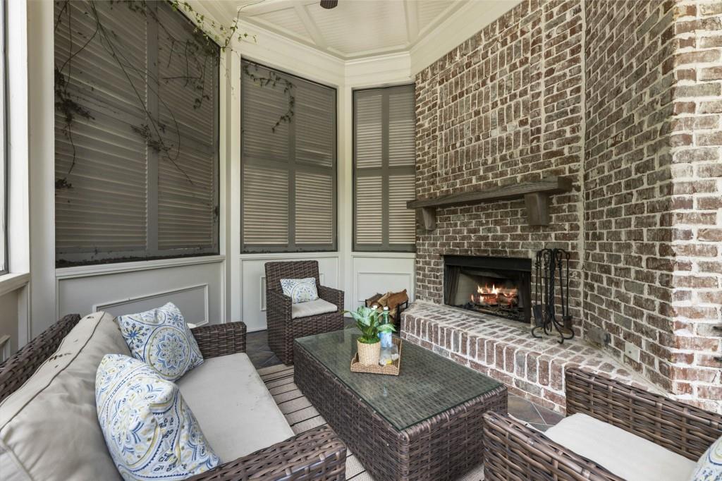 2810 Manor Bridge Drive Milton, GA 30004 - Photo 30 of 70 a living room with furniture and a fireplace