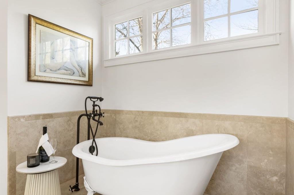 2810 Manor Bridge Drive Milton, GA 30004 - Photo 48 of 70 a white bath tub sitting in a bathroom