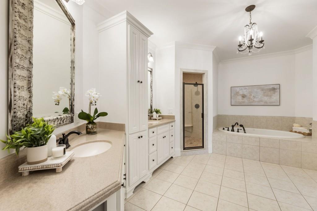 2810 Manor Bridge Drive Milton, GA 30004 - Photo 56 of 70 a bathroom with a tub sink and mirror