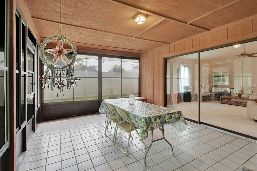 33 Rivocean Drive Ormond Beach, FL 32176 - Photo 16 of 31 a living room with furniture and a table