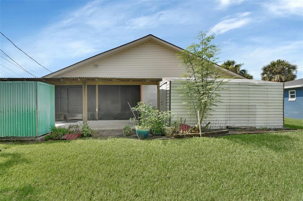 33 Rivocean Drive Ormond Beach, FL 32176 - Photo 19 of 31 a front view of house with yard and green space