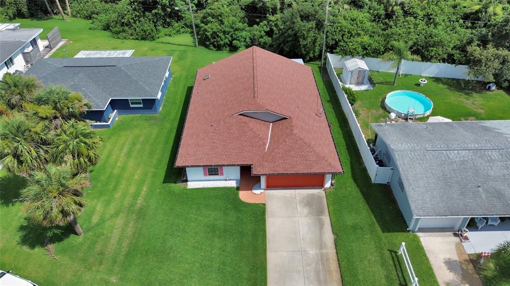 33 Rivocean Drive Ormond Beach, FL 32176 - Photo 23 of 31 an aerial view of a house with swimming pool garden and patio