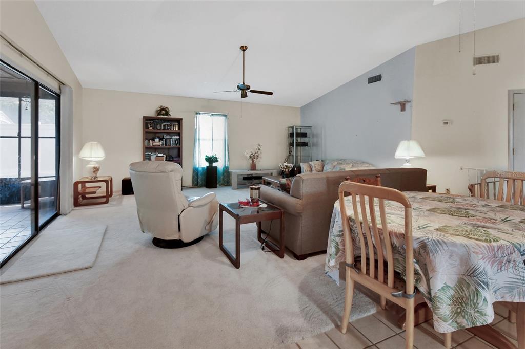 33 Rivocean Drive Ormond Beach, FL 32176 - Photo 4 of 31 a living room with furniture and a window