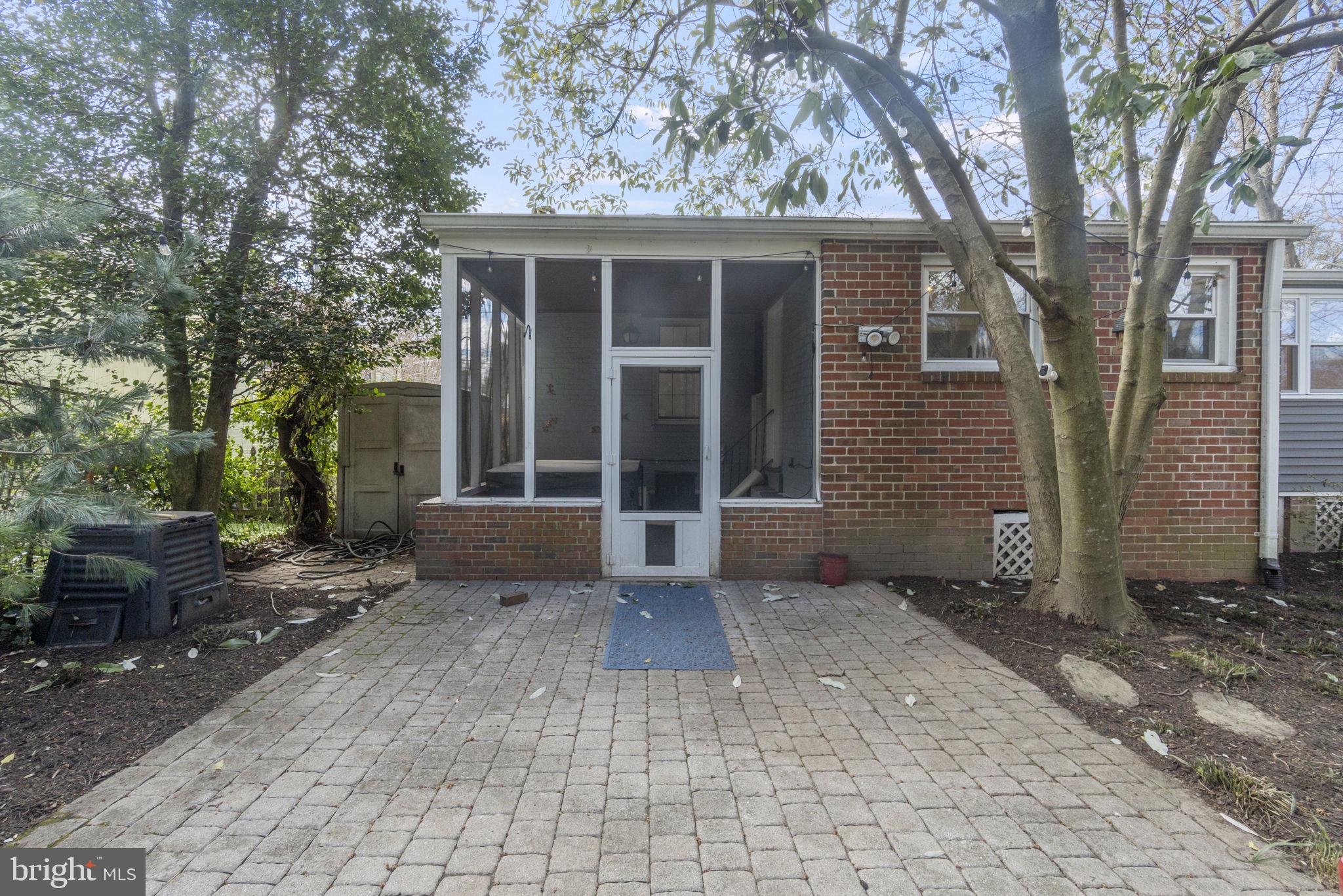 9123 Bradford Road Silver Spring, MD 20901 - Photo 19 of 22 a view of a house with a yard