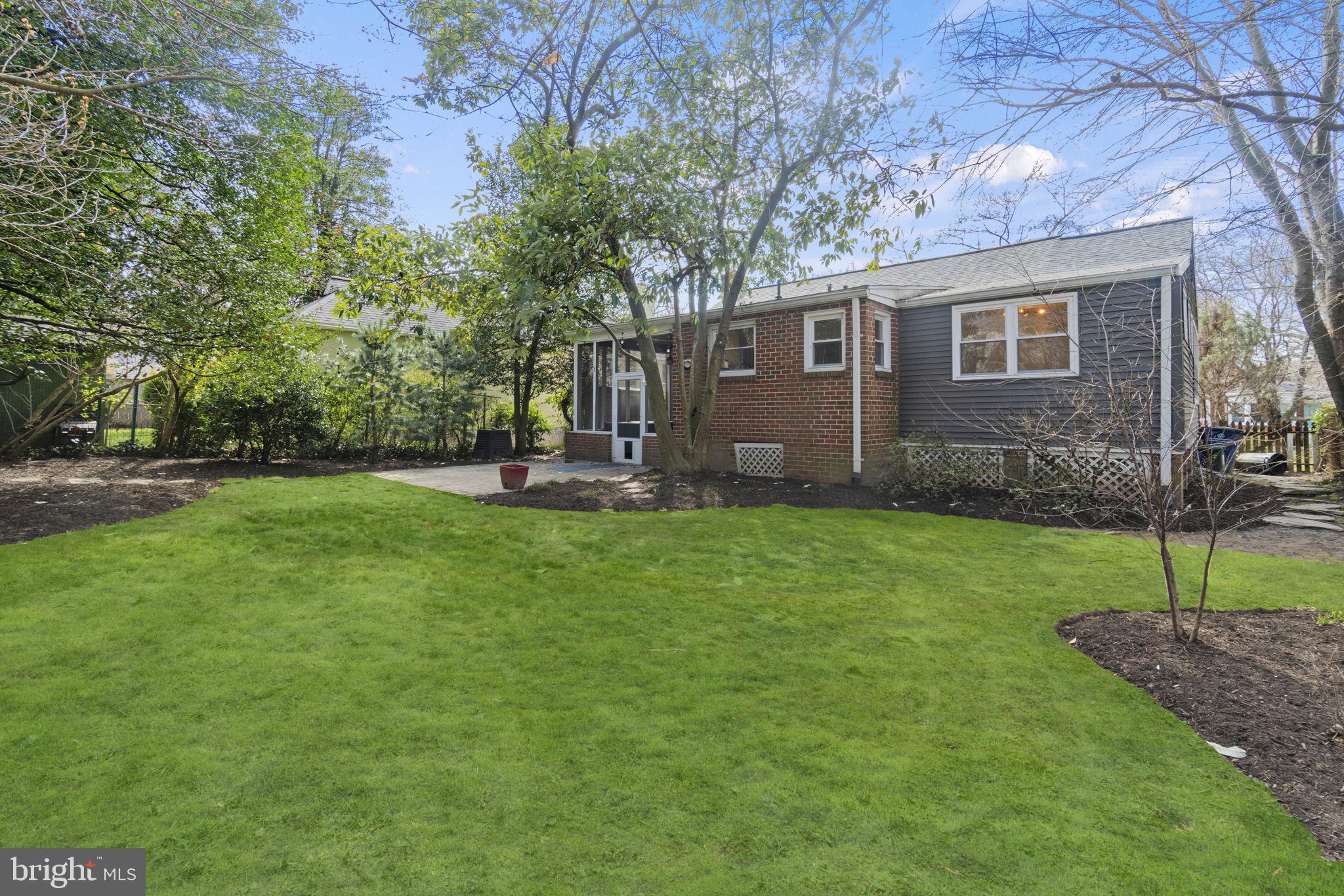 9123 Bradford Road Silver Spring, MD 20901 - Photo 22 of 22 a view of a house with a yard