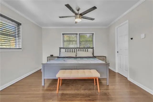 a view of a room with furniture window and wooden floor