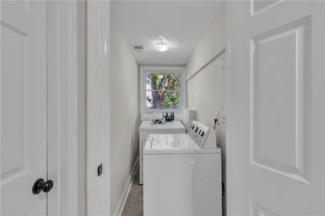a utility room with dryer and washer