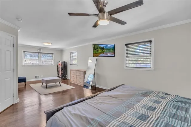 a bed room with a bed and a desk