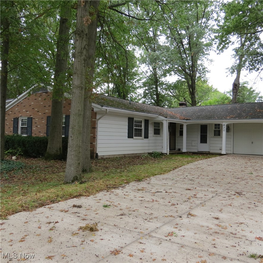 430 High Meadow Road Amherst, OH 44001 - Photo 3 of 29 Ranch-style home with a garage