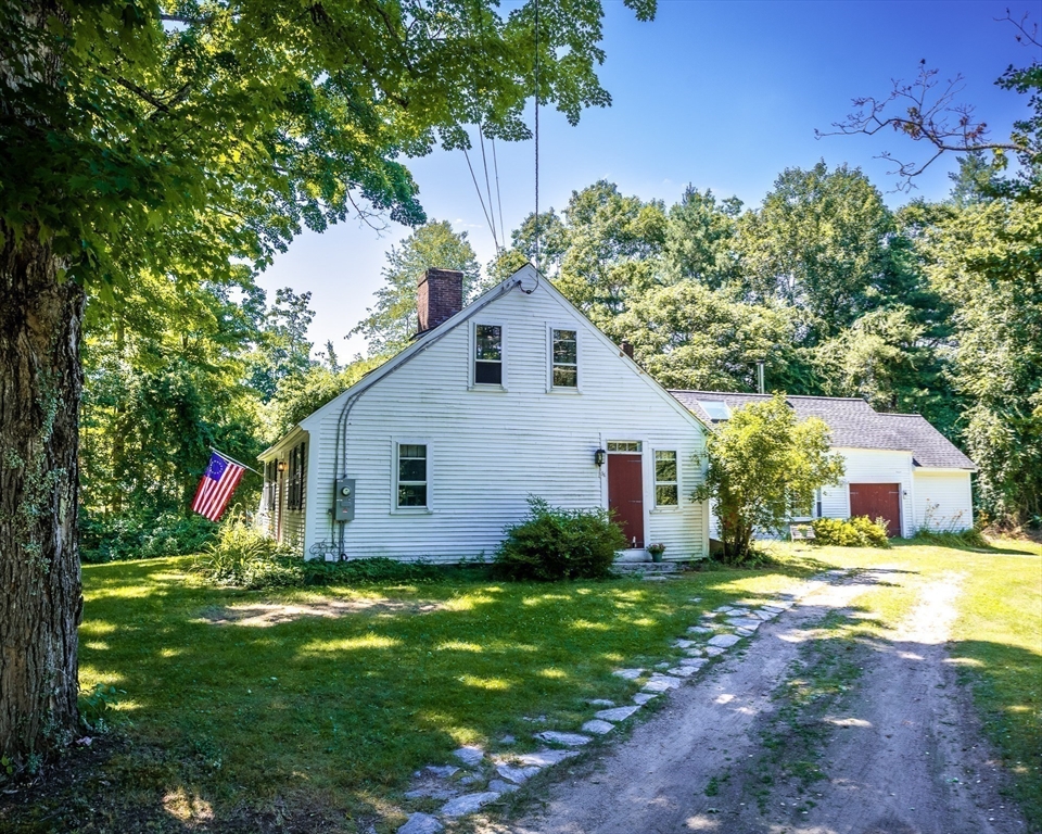 36 Patten Road Merrimack, NH 03054 - Photo 1 of 32 a front view of house with yard and green space