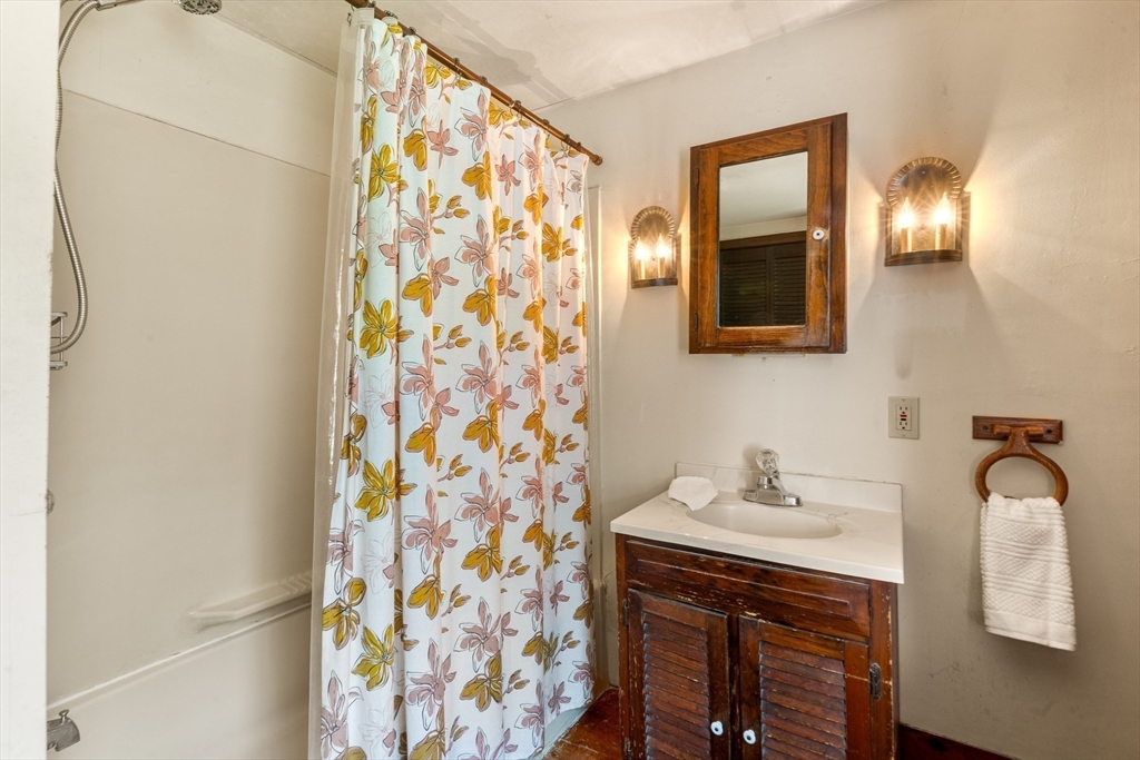 36 Patten Road Merrimack, NH 03054 - Photo 20 of 32 a bathroom with a sink and a mirror