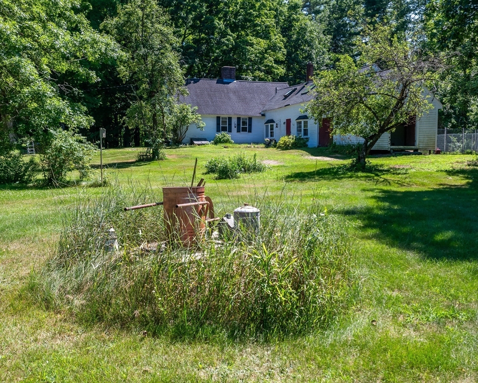 36 Patten Road Merrimack, NH 03054 - Photo 28 of 32 a view of a house with a big yard