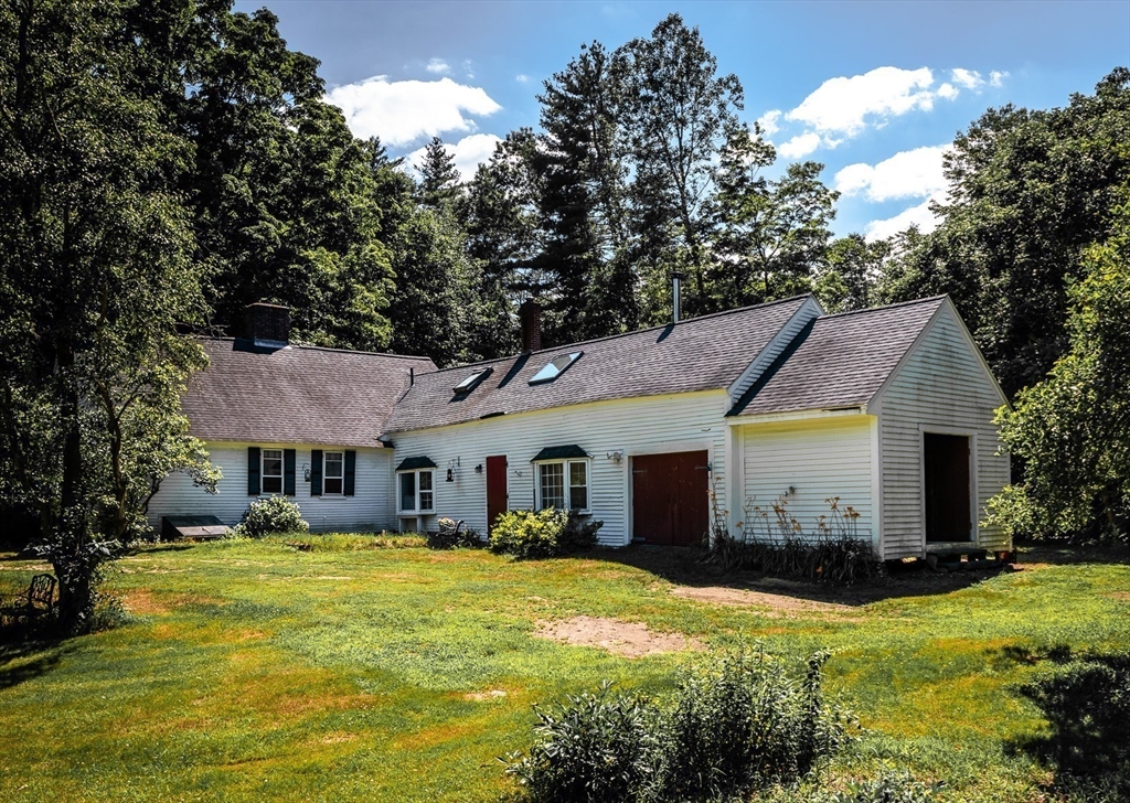 36 Patten Road Merrimack, NH 03054 - Photo 3 of 32 a front view of house with yard and green space