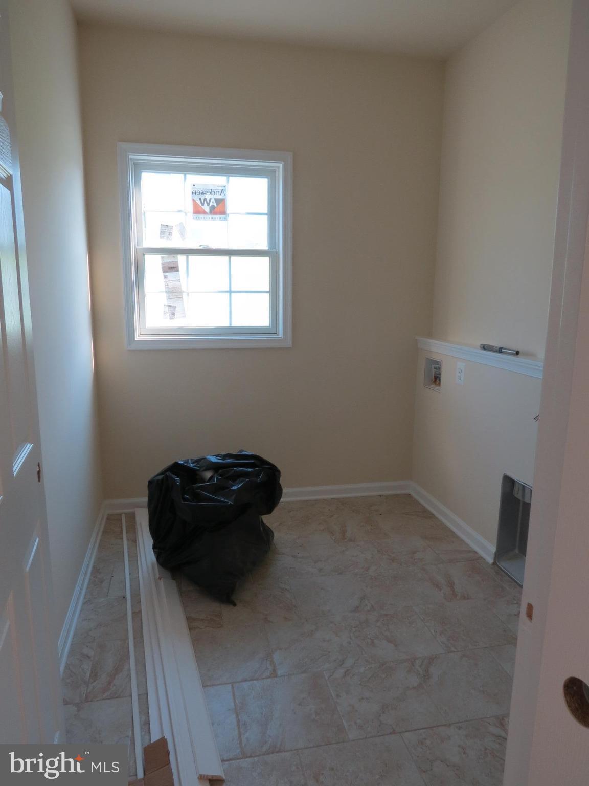 41 Wind Ridge Road Mount Airy, MD 21771 - Photo 11 of 30 Laundry room ceramic flooring & utility tub