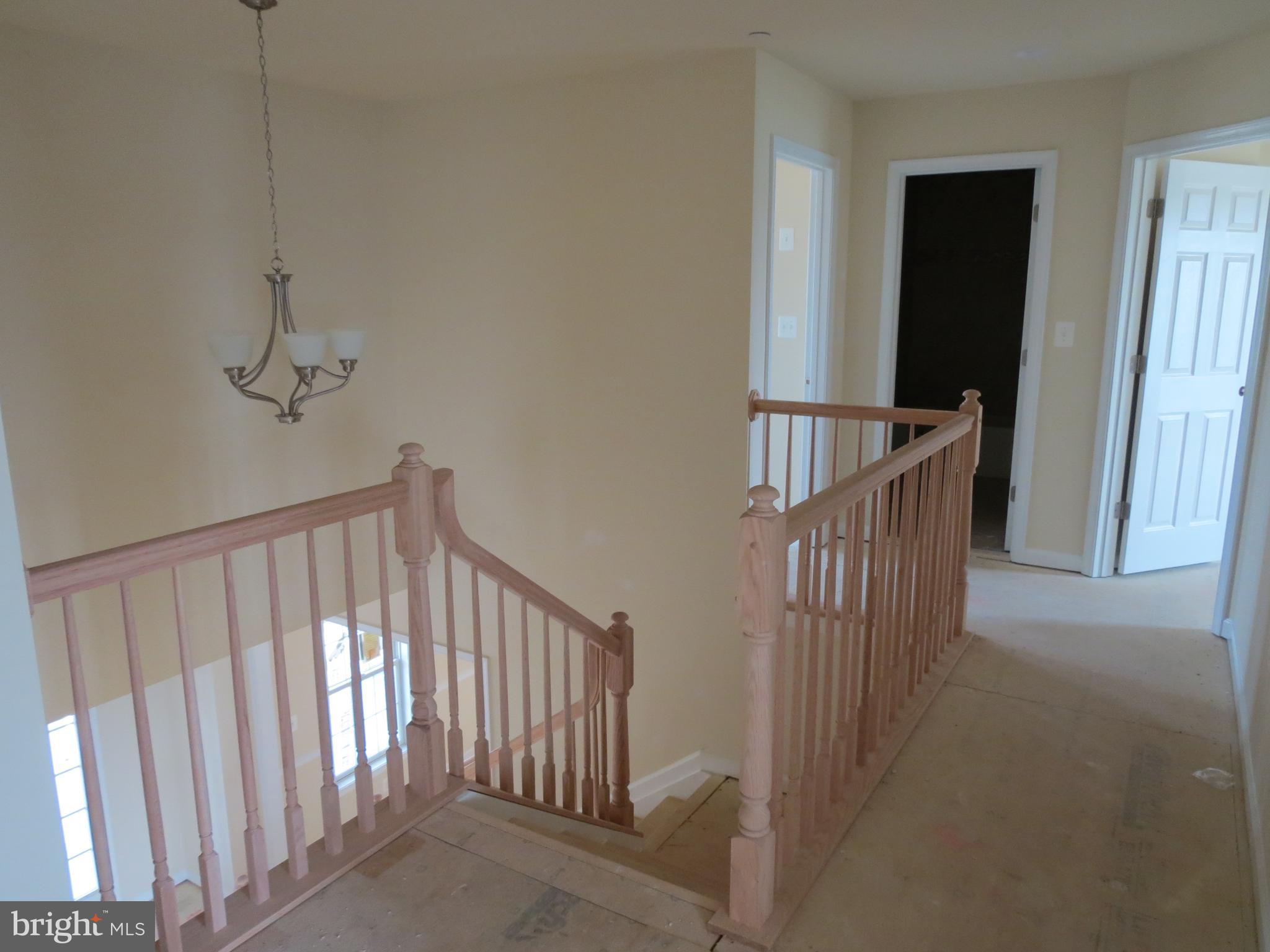 41 Wind Ridge Road Mount Airy, MD 21771 - Photo 14 of 30 Upstairs hallway, full bath & linen closet