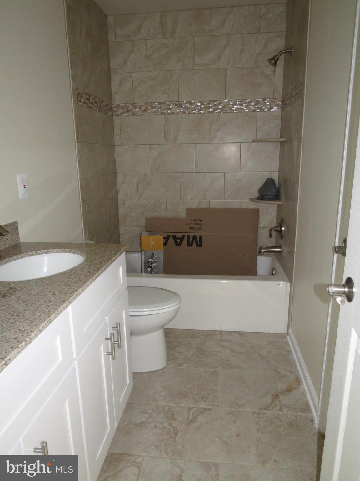 41 Wind Ridge Road Mount Airy, MD 21771 - Photo 20 of 30 Upstairs hall bath linen closet granite counters
