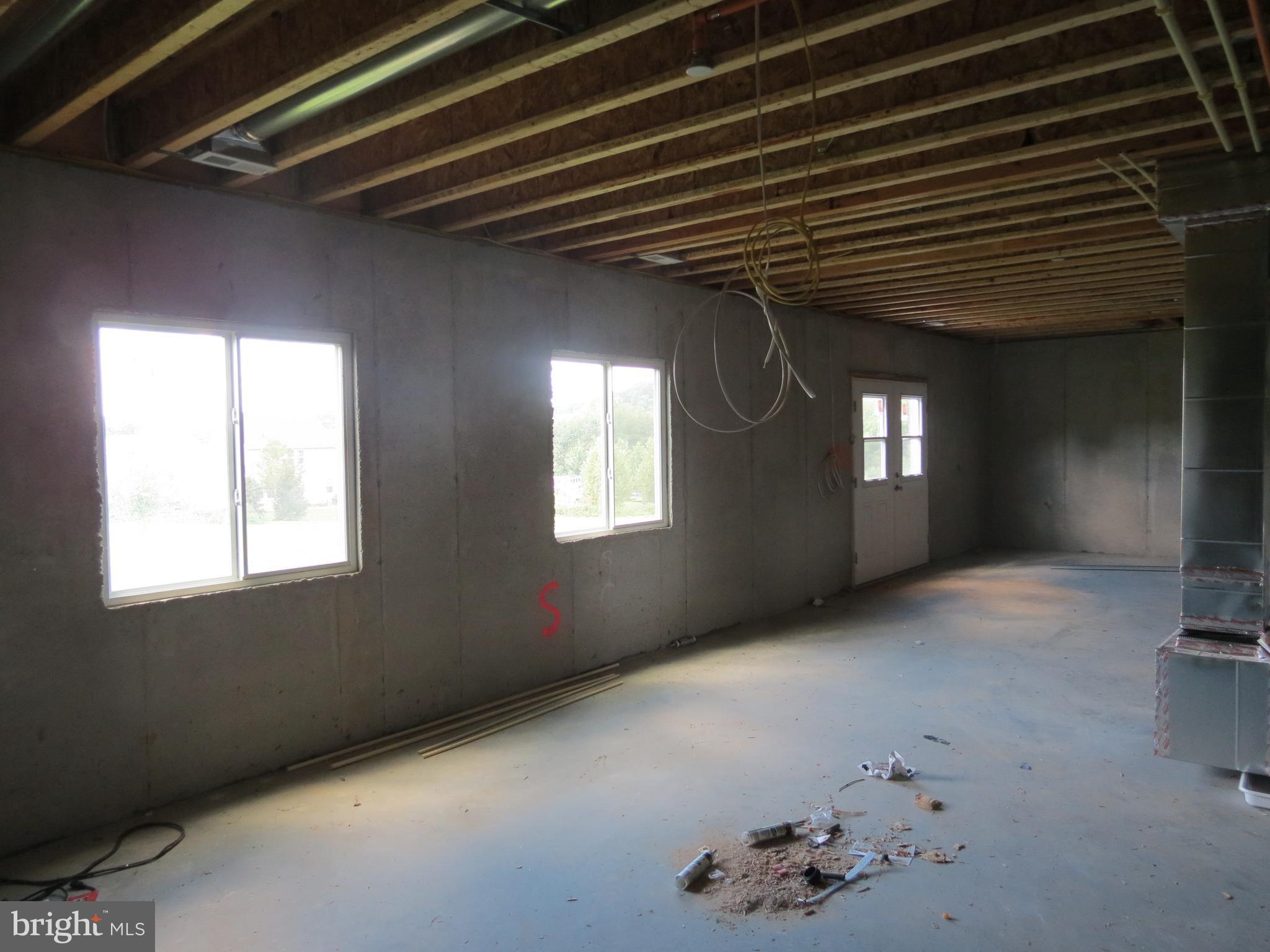 41 Wind Ridge Road Mount Airy, MD 21771 - Photo 23 of 30 Basement with full sized windows. level walk out