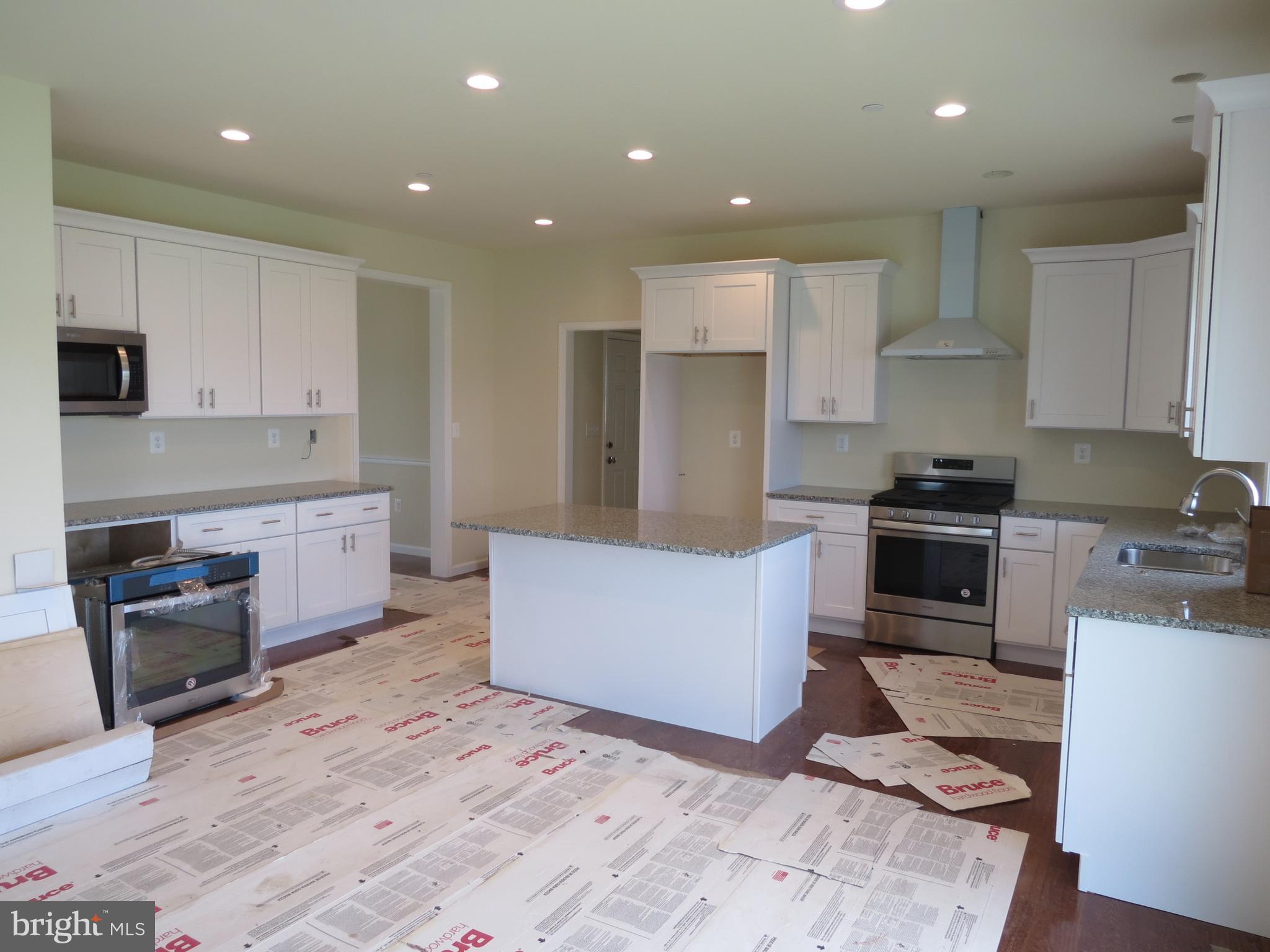 41 Wind Ridge Road Mount Airy, MD 21771 - Photo 6 of 30 Kitchen 5 Inch HW floors, granite SS appliancances