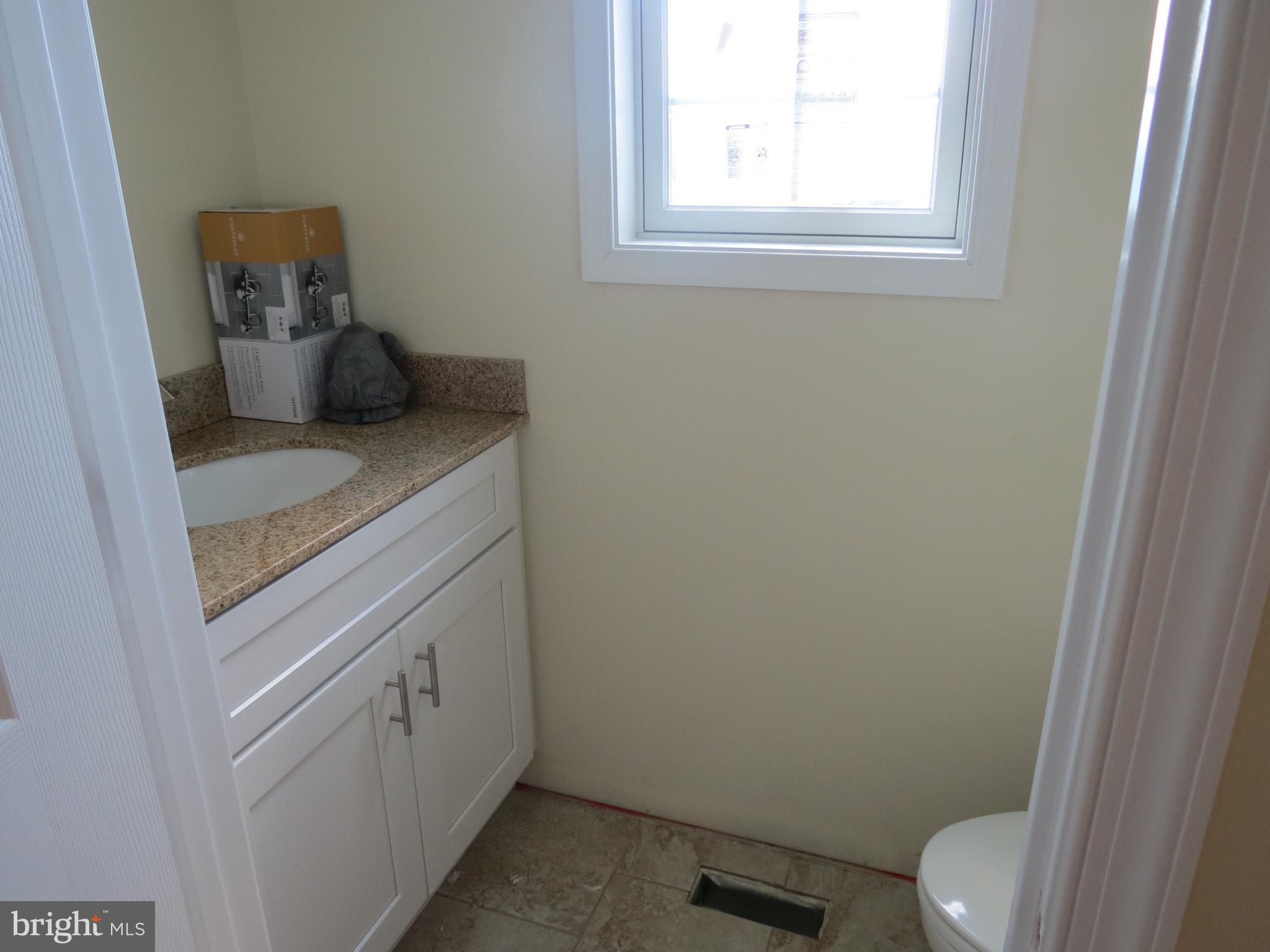 41 Wind Ridge Road Mount Airy, MD 21771 - Photo 10 of 30 1st floor powder rm granite counters