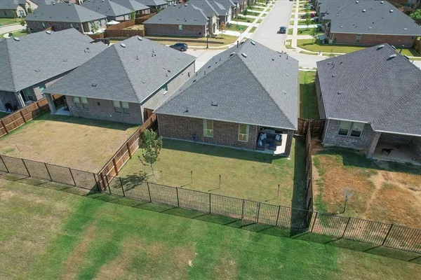 an aerial view of a house with swimming pool