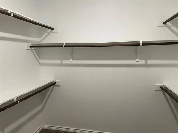 a view of small space with racks on the wall