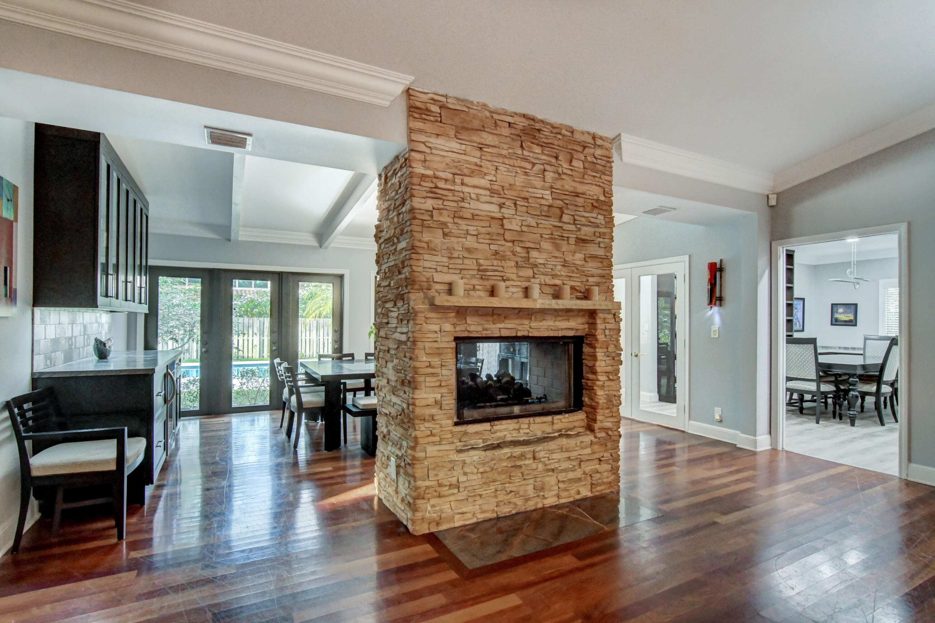 921 Southwest 20th Street Boca Raton, FL 33486 - Photo 13 of 56 a living room with furniture and a fireplace