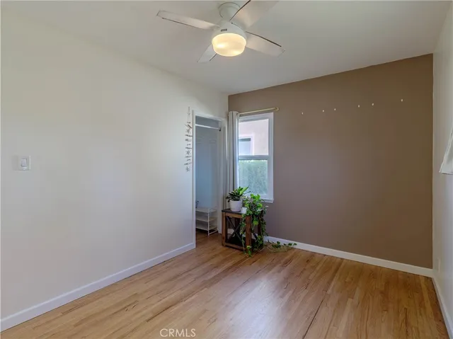 a room with a table and chairs