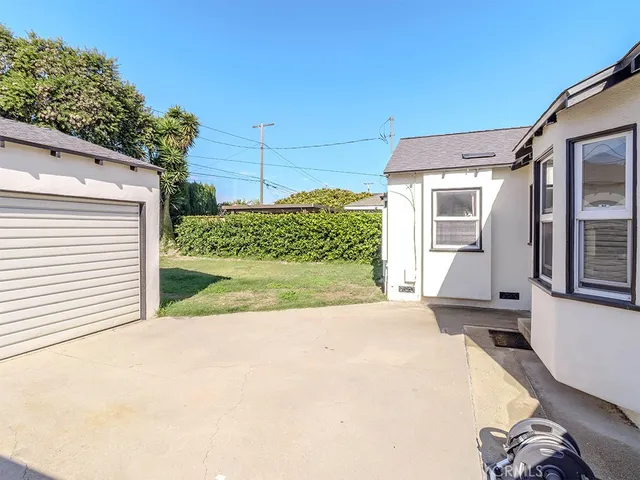 a view of a house with a street