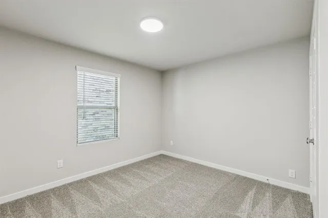 a bathroom with a toilet a sink and a bathtub