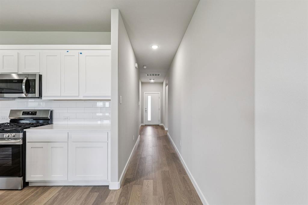 653 Sierra Ridge Lavon, TX 75166 - Photo 22 of 27 Entryway in the Harper home plan by Trophy Signature Homes – REPRESENTATIVE PHOTO