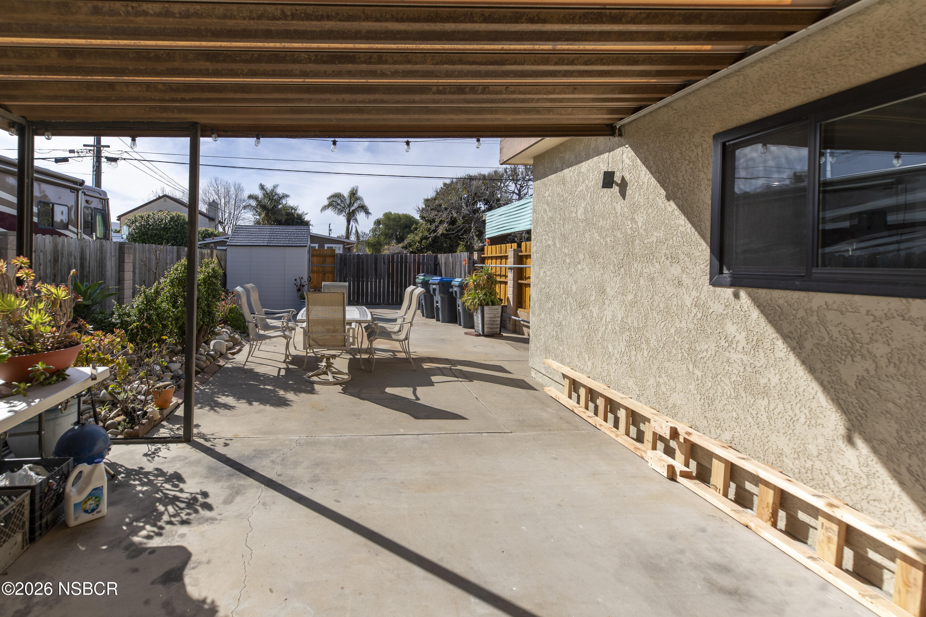 205 South E Street Lompoc, CA 93436 - Photo 33 of 49 a view of swimming pool with outdoor seating