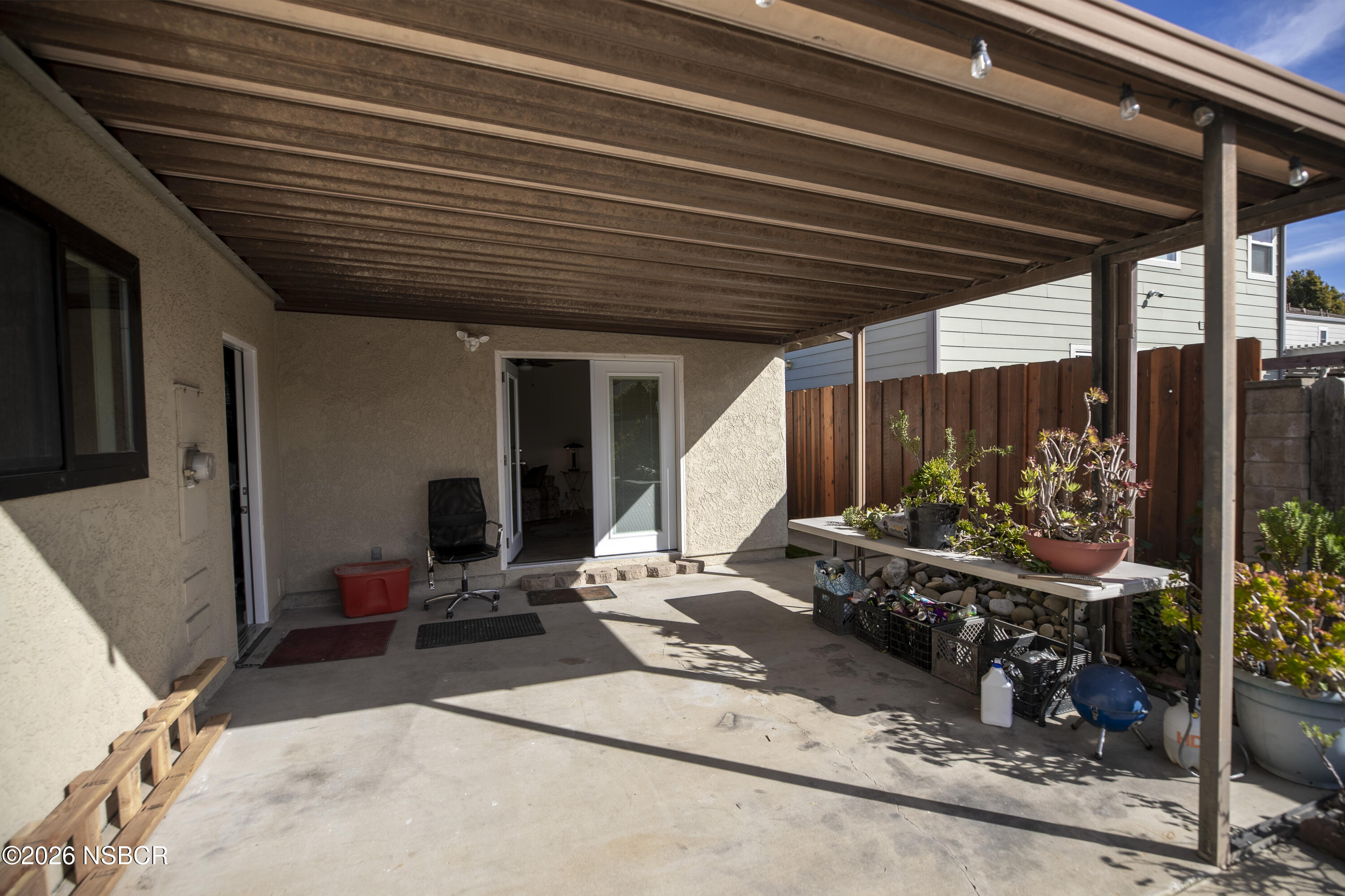 205 South E Street Lompoc, CA 93436 - Photo 36 of 49 a room with lots of wooden furniture