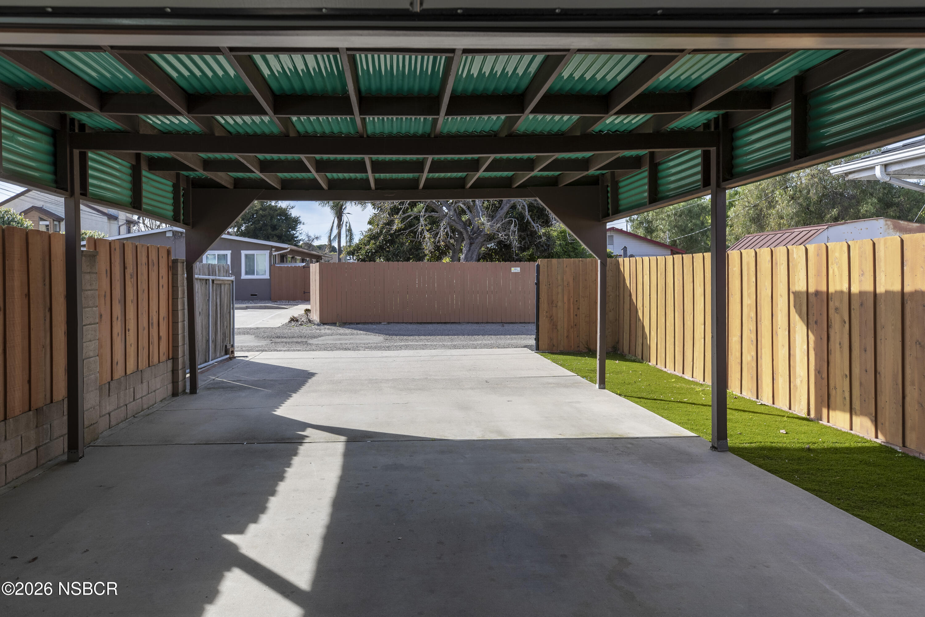 205 South E Street Lompoc, CA 93436 - Photo 47 of 49 a view of a backyard of a house