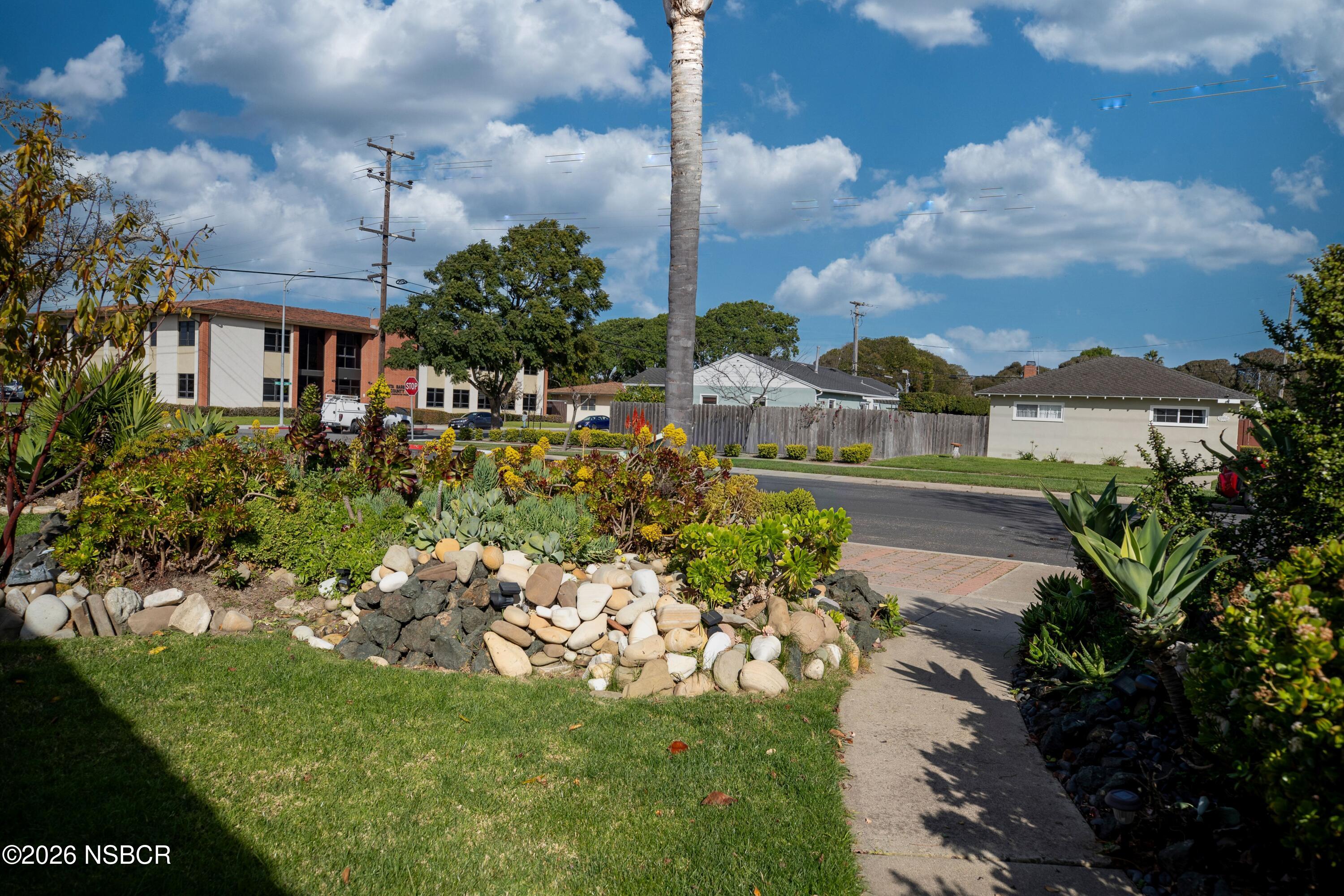 205 South E Street Lompoc, CA 93436 - Photo 49 of 49 a view of a garden