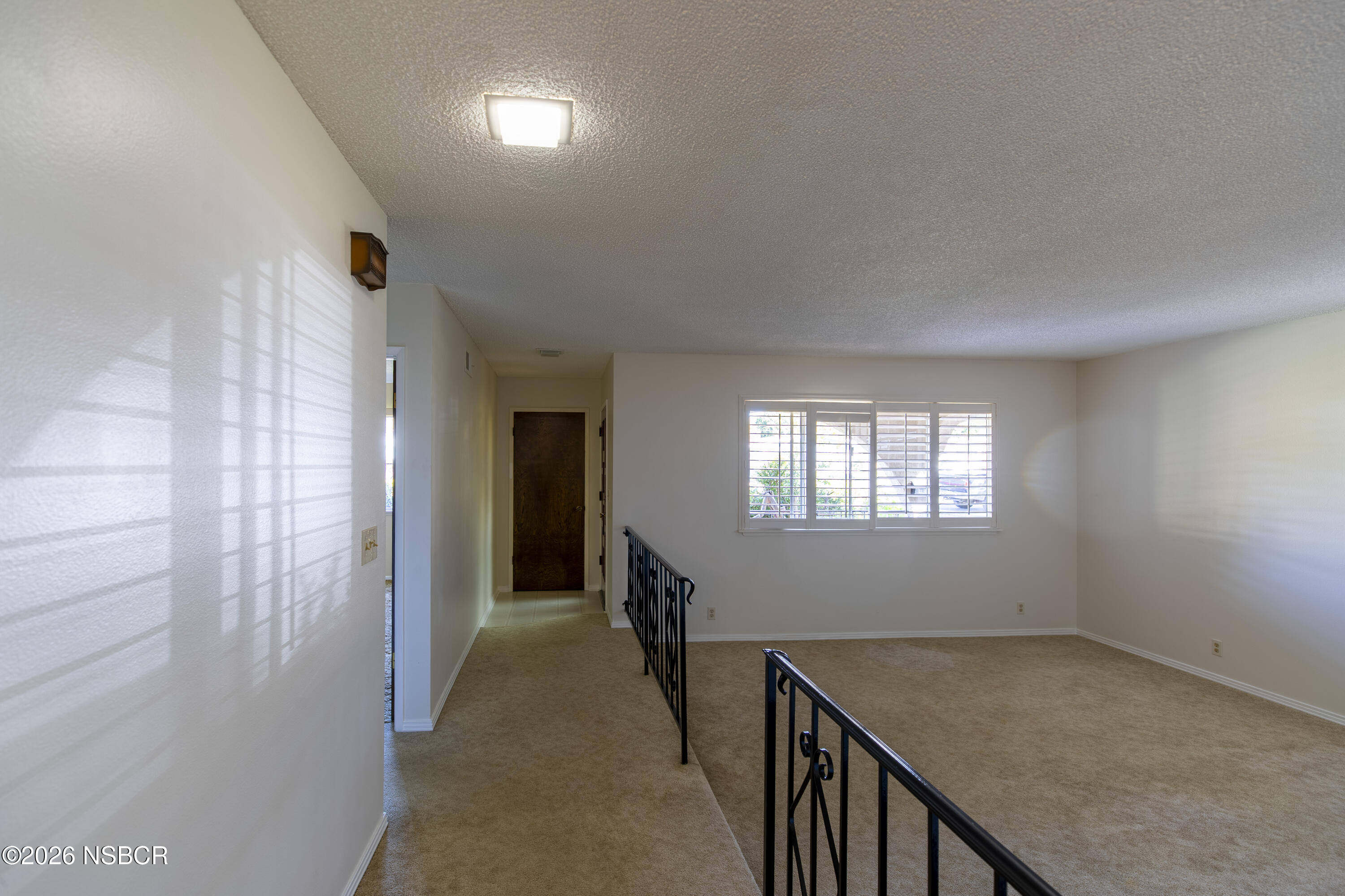 205 South E Street Lompoc, CA 93436 - Photo 7 of 49 a view of hallway with livingroom