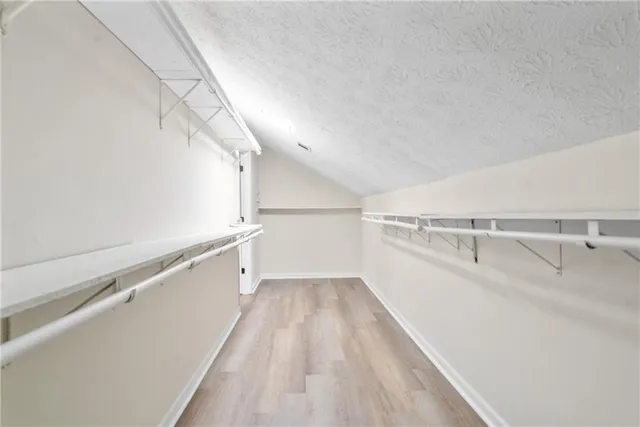 a view of a room with racks on the wall