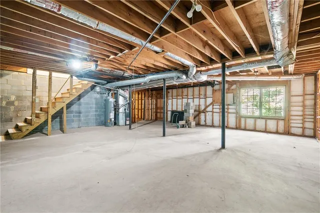 a view of an empty room with windows