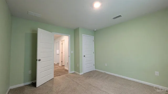an empty room with closet