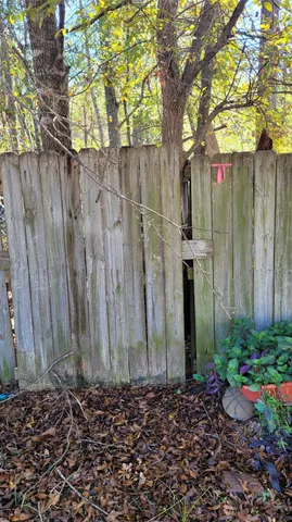 a view of a backyard of the house