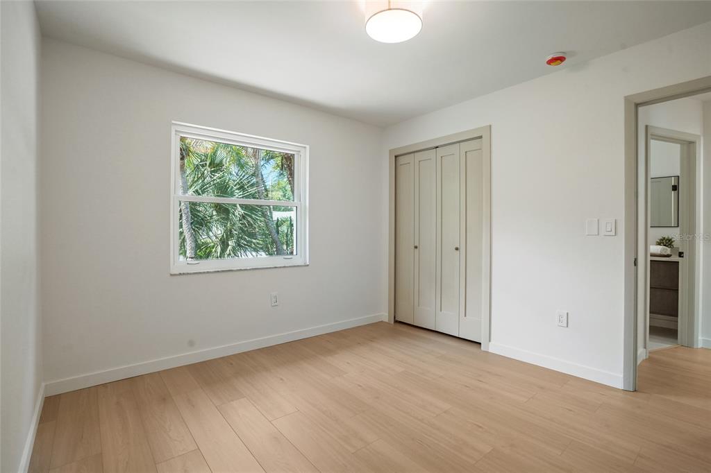 2370 Robyn Court Dunedin, FL 34698 - Photo 23 of 37 an empty room with windows